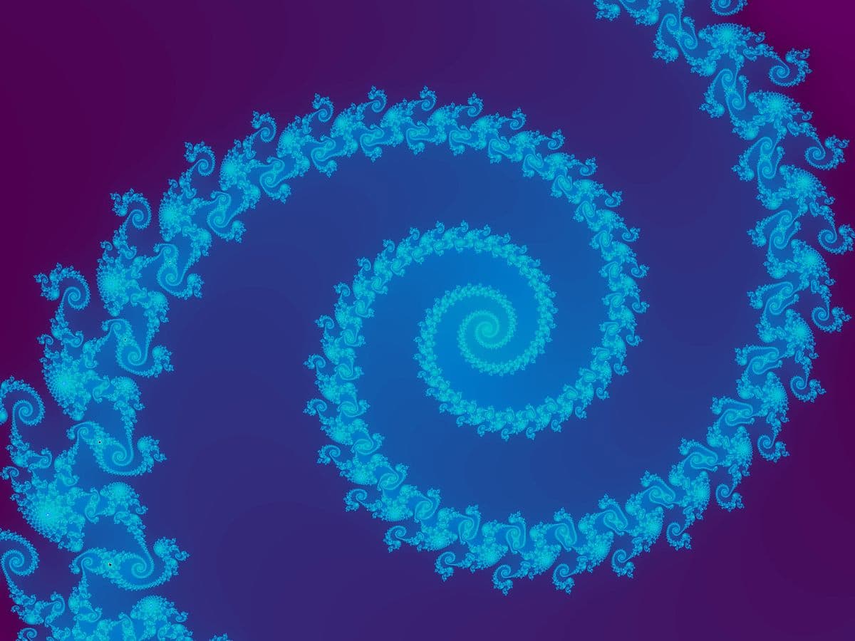 Bright cyan Mandelbrot fractal spiral with intricate curls on a purple-to-blue gradient background.