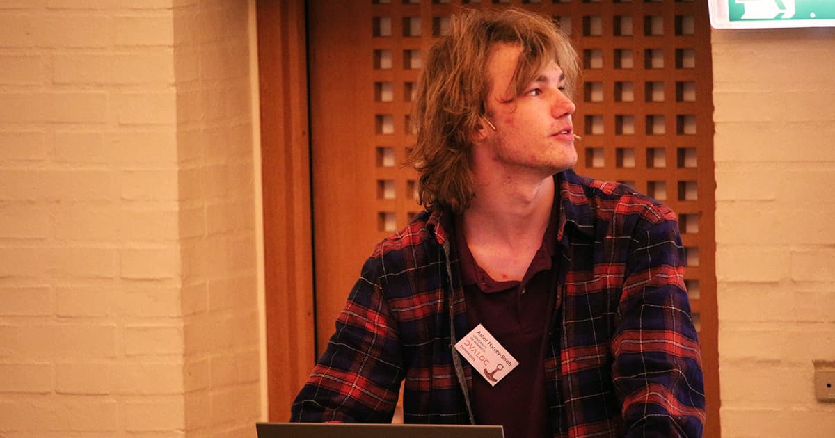 Asher Harvey-Smith presenting at Dyalog ’23, sharing his experiences teaching APL to fellow university students.