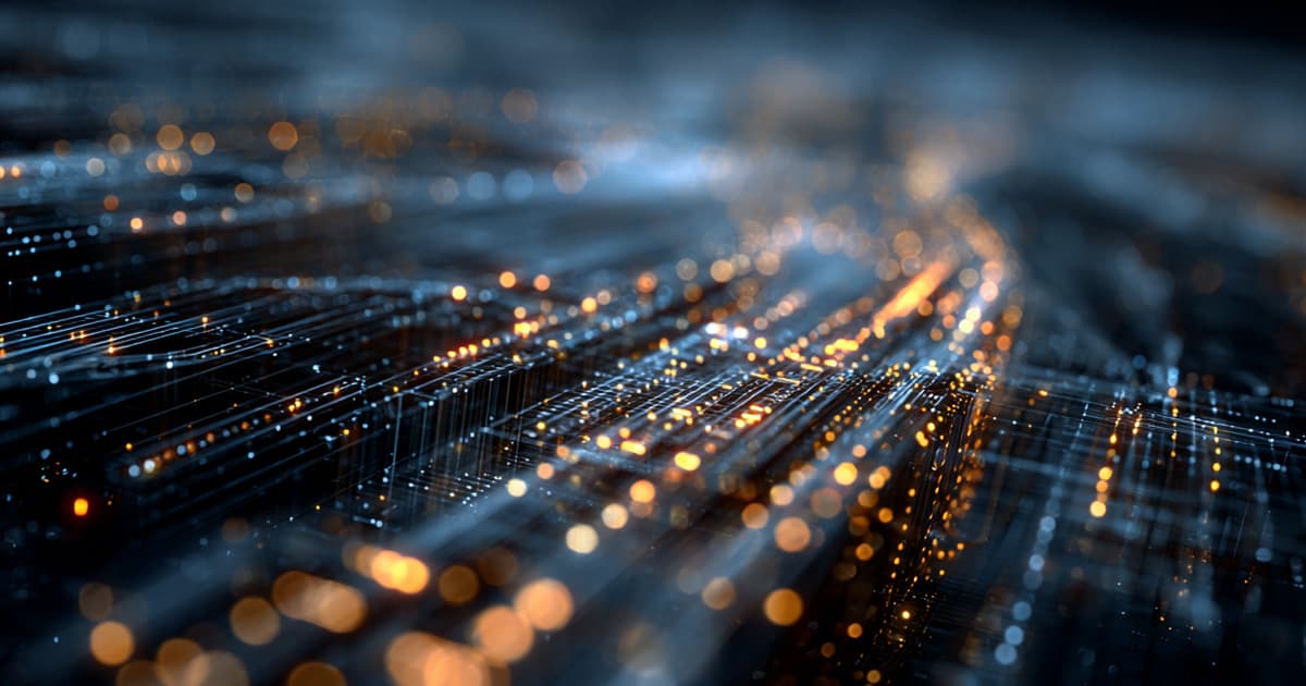 An abstract image of glowing orange and blue data streams, representing digital computation and interconnected systems.