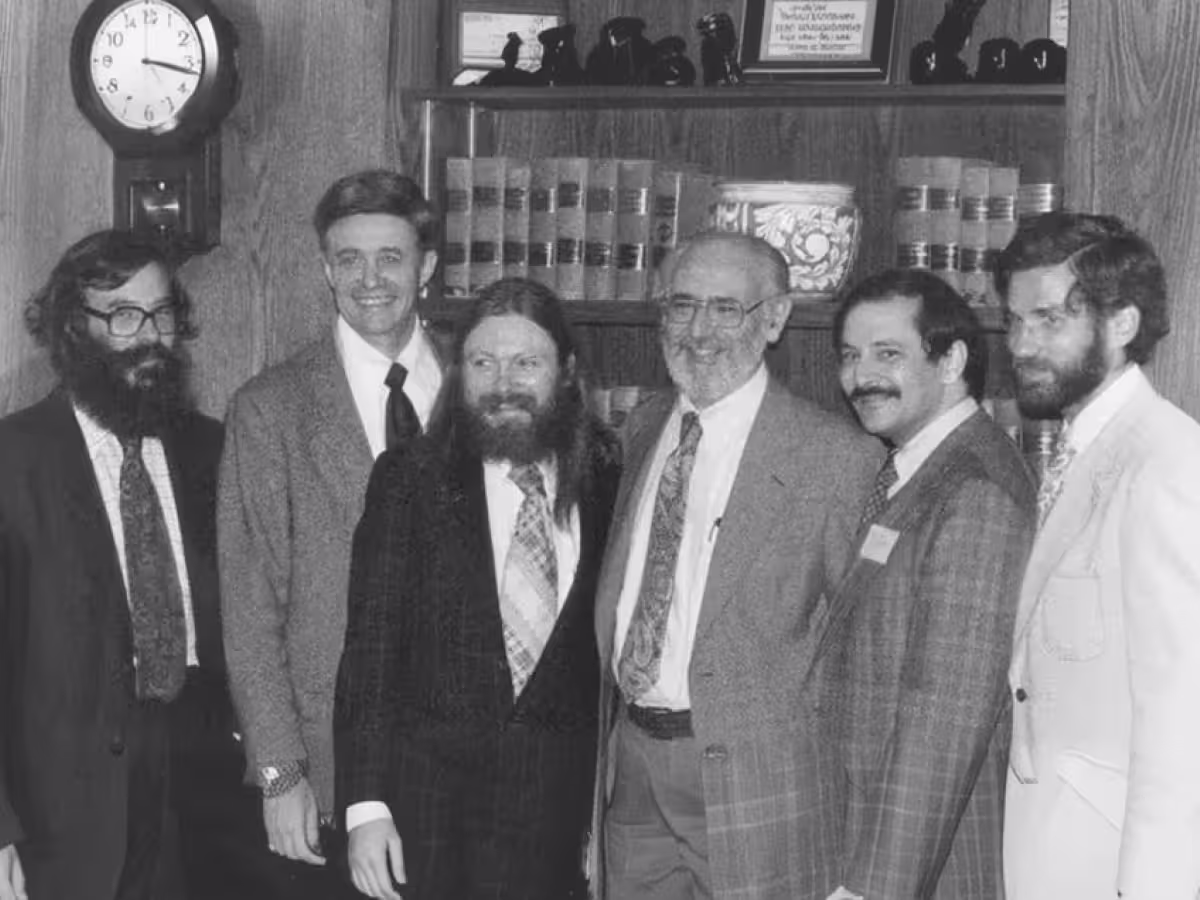 Left to right: Dick Lathwell, Ken Iverson, Roger Moore, Adin Falkoff, Phil Abrams, Larry Breed. Taken in the I.P. Sharp Associates hospitality suite during the 1978 APL User Meeting in Toronto, Canada. Image courtesy of the Computer History Museum in California